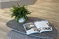 Senator Windows brochure on a coffee table with a plant, showing a lifestyle scene for downloading the product brochure